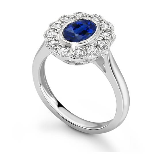 Oval Blue Sapphire and Diamond Halo Ring