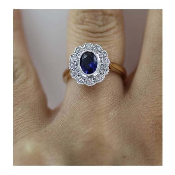 Oval Blue Sapphire and Diamond Halo Ring