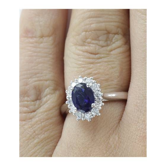 Oval Blue Sapphire and Diamond Cluster Ring