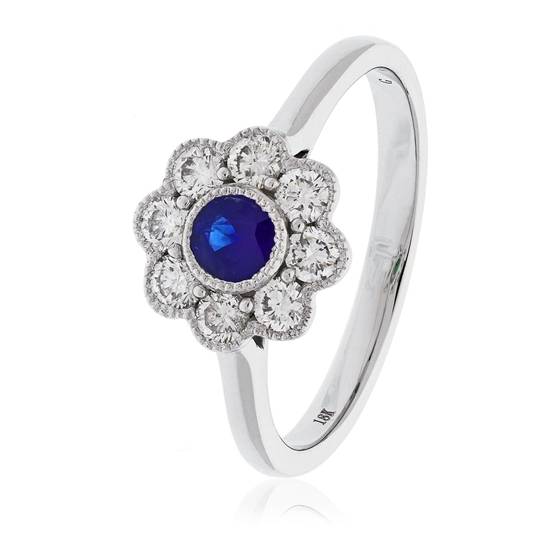 0.65ct Blue Sapphire and Diamond Bezel Set Halo Ring