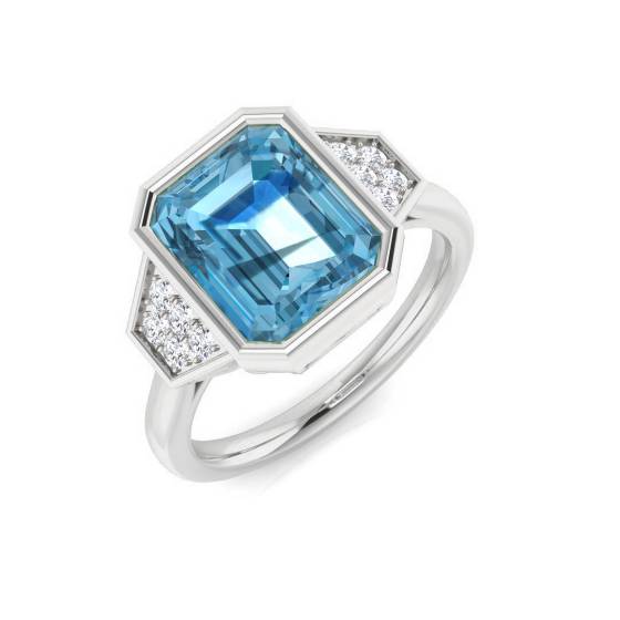 Emerald and Round Cut Blue Topaz Side Stone Ring