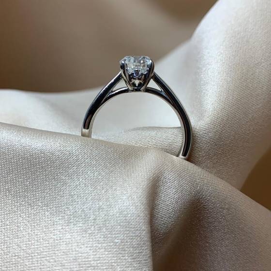 0.70ct SI1/H Natural Round Diamond Solitaire Ring in Platinum