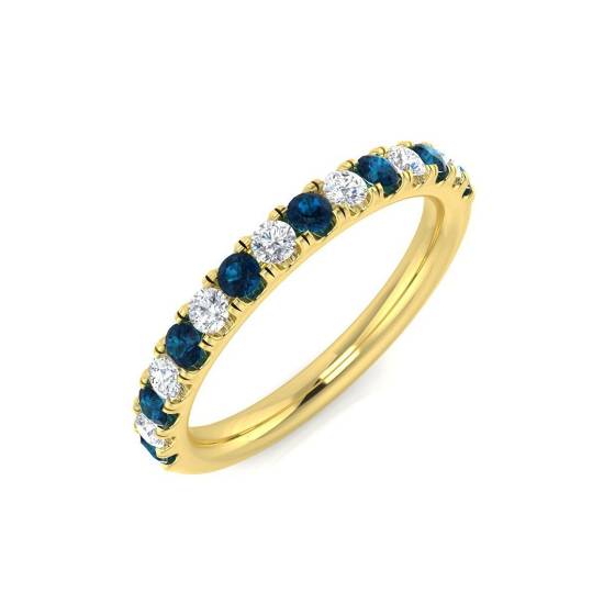 0.59ct SI2/G Round cut Blue Topaz Gemstone Ring in 9k Yellow Gold