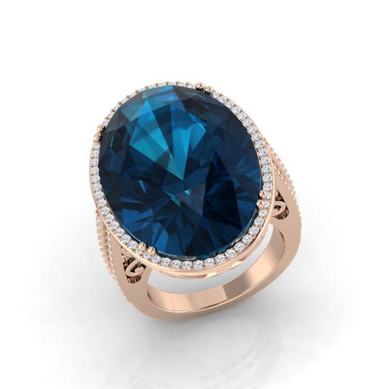 Oval and Round Cut Blue Topaz Halo Shoulder Set Ring