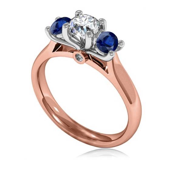 Modern Round Diamond and Blue Sapphire Trilogy Ring