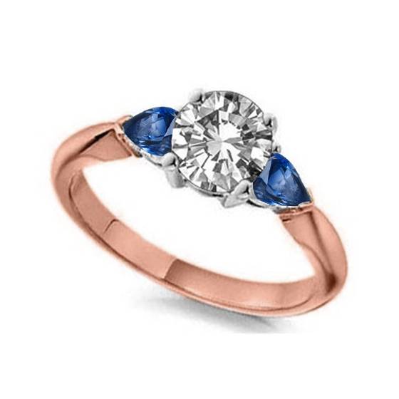 Round Diamond and Blue Sapphire Trilogy Ring