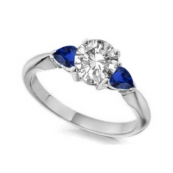 Round Diamond and Blue Sapphire Trilogy Ring