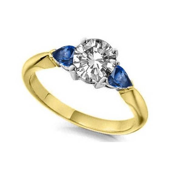Round Diamond and Blue Sapphire Trilogy Ring